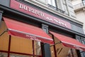 DP...AM Du Pareil Au MÃÂªme red sign text and brand logo facade entrance front of DPAM of shop