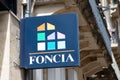 foncia logo brand and text sign front wall entrance office real estate agency