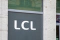 LCL logo brand and sign text windows facade front entrance bank signage