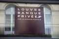 Louvre banque privee by La Banque Postale logo sign and brand logo facade wall entrance office