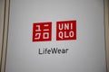 Uniqlo lifewear logo sign and brand text store chain clothes shop front facade Japan casual wear