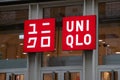 Uniqlo logo brand and text chain sign store clothes shop front of Japanese fashion