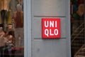 Uniqlo logo brand and text red sign store fashion storefront clothes facade wall shop from Japan