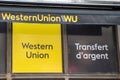 Western Union wu sign text and brand logo on entrance facade office company american financial