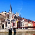 Lyon cityscape from Saone river with footbridge Royalty Free Stock Photo