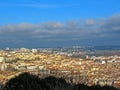 Lyon, France : Aerial view of the city wide panorama with landmarks surrounded by red rooftops and chimneys Royalty Free Stock Photo