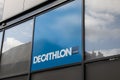 decathlon contact sign text and brand logo entrance facade wall store building in bordeaux town