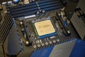 3rd Gen AMD`s Ryzen 9 3900X desktop processor on a motherboard - close up, detail