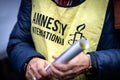 Amnesty International member with logo clothings