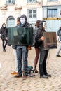 Young activists protesting animal killings in front of the Saint Jean Cathedral, Lyon, France Royalty Free Stock Photo