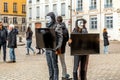 Young activists protesting animal killings in front of the Saint Jean Cathedral, Lyon, France Royalty Free Stock Photo