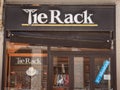 Tie Rack logo in front of their shop for Lyon. Tie Rack is a British chain of fashion retailers specialized in Ties, cufflinks, an Royalty Free Stock Photo