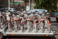 Velo`v bicycles on display on a truck, being ready to be lifted on a rental station. Royalty Free Stock Photo
