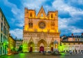 LYON, FRANCE, JULY 22, 2017: Sunset view of the cathedral of saint jean baptist in the historical center of Lyon surrounded by Royalty Free Stock Photo