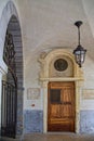 Door of cloister of ancient hospital Hotel-Dieu and portrait of Francois Rabelais