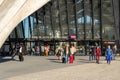 People arriving and departing at Gare de Lyon Saint Exupery SNCF main station, with carry on bags