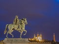 Lyon at night with monument `The horse` and church Notre-Dame de Fourviere Royalty Free Stock Photo