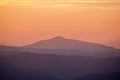 Lysa hora hill in Moravskoslezske Beskydy mountains during sunset with colorful sky Royalty Free Stock Photo