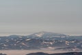 Lysa hora in Moravskoslezske Beskydy mountains from Horna luka hill in Mala Fatra mountains in Slovakia during winter Royalty Free Stock Photo