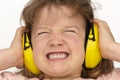 Noise sucks! Child wears hearing protection