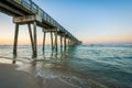 The M.B. Miller County Pier and Gulf of Mexico at sunrise, in Panama City Beach, Florida Royalty Free Stock Photo