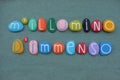 M`illumino d`immenso, short poetic composition by Giuseppe Ungaretti with multicolored stone letters