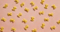 MaÃÂaroni or pasta bow shape in chaos order on pink background