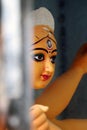 Maa Durga is in the cage. Clay idol of Goddess Durga, under preparation for Bengal`s Durga Puja festival at Kumartuli in Kolkata Royalty Free Stock Photo