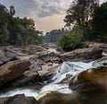 Maak Ngaew Waterfall and movement of flowing water cascades, at sunset, near Pakse,Laos