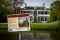 Sign Vroeger en Nu hiking route at river Vecht