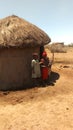 Maasai children standing infront of their boma