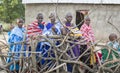 Maasai ladies resting inside their boma Royalty Free Stock Photo