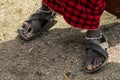 Maasai man wearing sandals with soles made of tire strips, in Arusha, East Africa Royalty Free Stock Photo