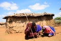 Maasai men lighting fire, Kenya Royalty Free Stock Photo