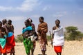 Maasai people are dancing and celebrating outdoors