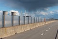 Maasbracht, Limburg, The Netherlands - Wide double laned cycling road over the river Maas with energy plants in the background