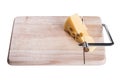 Maasdam cheese with holes is cut on a wooden Board Royalty Free Stock Photo