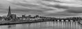 Black and white panoramic image of the skyline of Maastricht  with views on the Sint Servaas bridge, the boat company for day trip Royalty Free Stock Photo