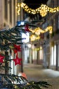 Christmas greetings in a tree in Maastricht in the Stokstraat quarter. Wishing customers and tourist a happy holiday season.