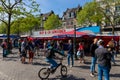 Empty Market square in Maastricht with a few sellers which need to take COVID-19 pre-caution measurements when selling products