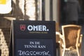 MAASTRICHT, NETHERLANDS - NOVEMBER 10, 2022: logo of Omer beer on a reseller in Maastricht. Biere Saint Omer is a Belgian trappist