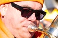 A wind band musician playing during the Carnival parade through the village of Amby (Maastricht)