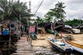 A floating village at Mabul Island. WIth small boat