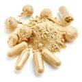 Maca root powder and capsules on white background Royalty Free Stock Photo