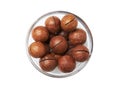 Macadamia nuts in bowl on a white Royalty Free Stock Photo