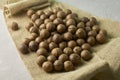A macadamia nuts on burlap background backdrop Royalty Free Stock Photo