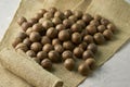 A macadamia nuts on burlap background backdrop Royalty Free Stock Photo