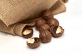 a macadamia nuts on burlap background backdrop Royalty Free Stock Photo