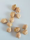 The macadamia nuts in white background.