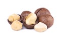 Macadamia nuts, on white background. Shelled and unshelled macadamia. Royalty Free Stock Photo
